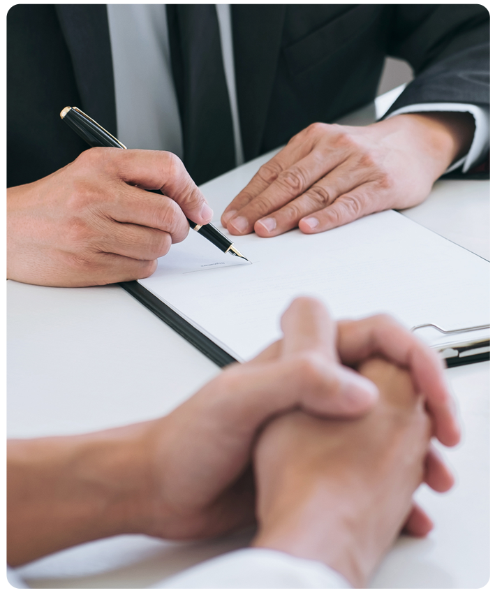 Lawyer talking with client about medical malpractice case