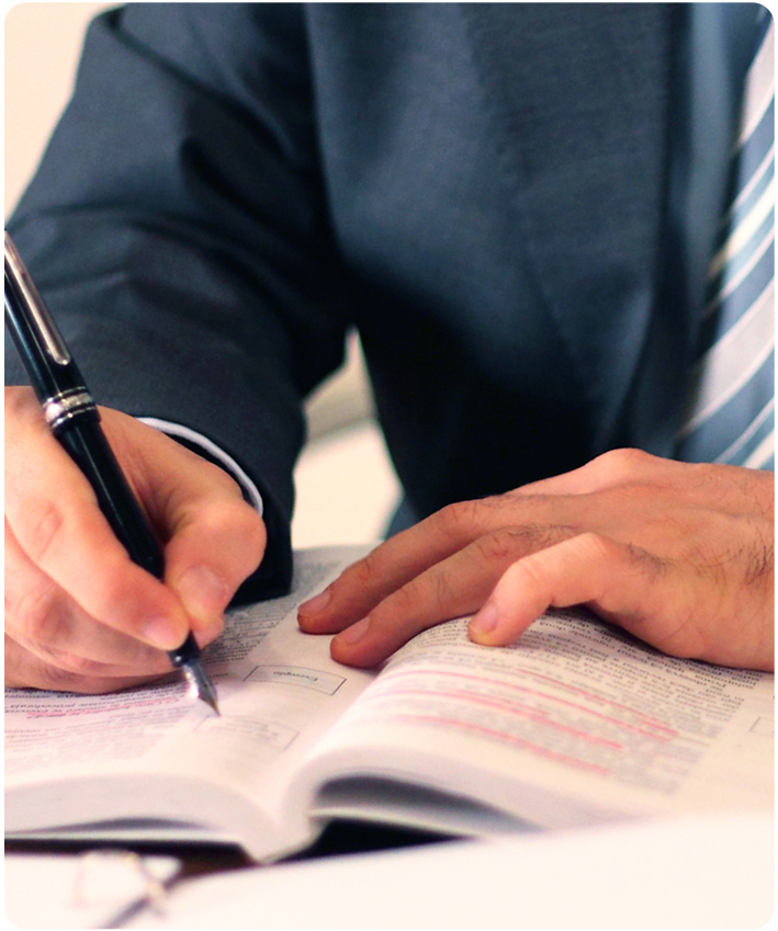 Lawyer writing case notes for client